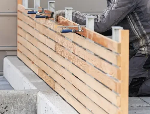 Damaged boundary fence replaced with a new residential fence in west Melbourne