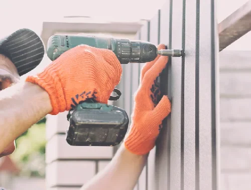 New boundary fence being installed for a residential property