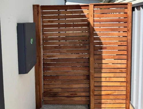 Slat gate installation to match modern fencing styles around the home
