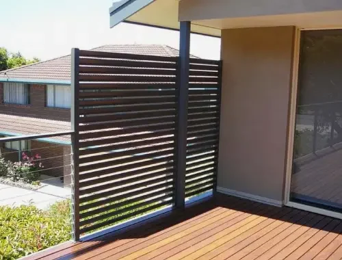 Slat privacy screen installed for a modern outdoor living area