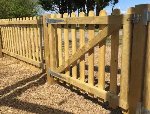 Timber picket fence installed at the front of a residential home